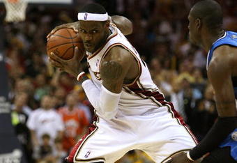CLEVELAND - MAY 28: LeBron James #23 of the Cleveland Cavaliers handles the ball against the Orlando Magic in Game Five of the Eastern Conference Finals during the 2009 Playoffs at Quicken Loans Arena on May 28, 2009 in Cleveland, Ohio. NOTE TO USER: User expressly acknowledges and agrees that, by downloading and or using this photograph, User is consenting to the terms and conditions of the Getty Images License Agreement  (Photo by Elsa/Getty Images)
