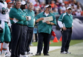 DENVER - NOVEMBER 02:  Head coach Tony Sparano (2nd R) of the Miami Dolphins directs his team against the Denver Broncos during NFL action at Invesco Field at Mile High on November 2, 2008 in Denver, Colorado. The Dolphins defeated the Broncos 26-17.  (Photo by Doug Pensinger/Getty Images)