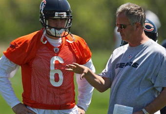 LAKE FOREST, IL - MAY 20:  Jay Cutler #6 of the Chicago Bears and offensive coordinator Ron Turner discuss a play during an organized team activity (OTA) practice on May 20, 2009 at Halas Hall in Lake Forest, Illinois.  (Photo by Jonathan Daniel/Getty Images)