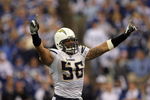 INDIANAPOLIS - JANUARY 13:  Shawne Merriman #56 of the San Diego Chargers celebrates after their 28-24 win against the Indianapolis Colts during their AFC Divisional Playoff game at the RCA Dome on January 13, 2008 in Indianapolis, Indiana.  (Photo by Doug Pensinger/Getty Images)