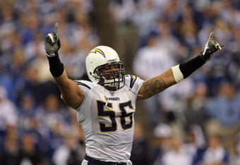 INDIANAPOLIS - JANUARY 13:  Shawne Merriman #56 of the San Diego Chargers celebrates after their 28-24 win against the Indianapolis Colts during their AFC Divisional Playoff game at the RCA Dome on January 13, 2008 in Indianapolis, Indiana.  (Photo by Doug Pensinger/Getty Images)