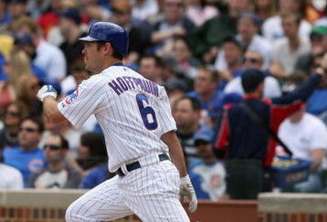 CHICAGO - MAY 2:  Micah Hoffpauir #6 of the Chicago Cubs bats against the Florida Marlins during the game on May 2, 2009 at Wrigley Field in Chicago, Illinois. (Photo by Jonathan Daniel/Getty Images) 