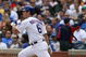CHICAGO - MAY 2: Micah Hoffpauir #6 of the Chicago Cubs bats against the Florida Marlins during the game on May 2, 2009 at Wrigley Field in Chicago, Illinois. (Photo by Jonathan Daniel/Getty Images)