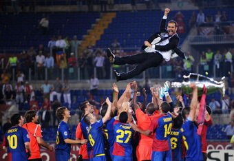 ROME - MAY 27:  Josep Guardiola coach of Barcelona is  thrown into the air by his players as they celebrate winning the UEFA Champions League Final match between Manchester United and Barcelona at the Stadio Olimpico on May 27, 2009 in Rome, Italy.  (Photo by Shaun Botterill/Getty Images)