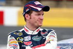 CONCORD, NC - MAY 25:  Dale Earnhardt Jr., driver of the #88 National Guard/AMP Energy Chevrolet, stands next to his car during a red flag due to rain in the NASCAR Sprint Cup Series Coca-Cola 600 on May 25, 2009 at Lowe's Motor Speedway in Concord, North Carolina.  (Photo by Scott Halleran/Getty Images for NASCAR)