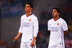 ROME - MAY 27:  Carlos Tevez of Manchester United and Cristiano Ronaldo of Manchester United look dejected after Barcelona won the UEFA Champions League Final match between Barcelona and Manchester United at the Stadio Olimpico on May 27, 2009 in Rome, Italy. Barcelona won 2-0.  (Photo by Laurence Griffiths/Getty Images)