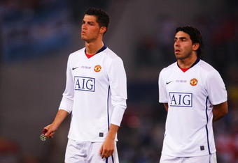 ROME - MAY 27:  Carlos Tevez of Manchester United and Cristiano Ronaldo of Manchester United look dejected after Barcelona won the UEFA Champions League Final match between Barcelona and Manchester United at the Stadio Olimpico on May 27, 2009 in Rome, Italy. Barcelona won 2-0.  (Photo by Laurence Griffiths/Getty Images)