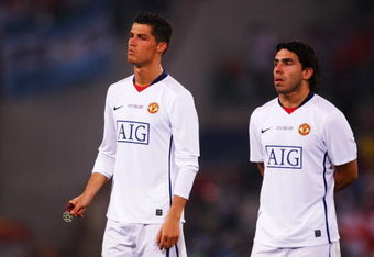 ROME - MAY 27:  Carlos Tevez of Manchester United and Cristiano Ronaldo of Manchester United look dejected after Barcelona won the UEFA Champions League Final match between Barcelona and Manchester United at the Stadio Olimpico on May 27, 2009 in Rome, Italy. Barcelona won 2-0.  (Photo by Laurence Griffiths/Getty Images)