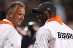 CHICAGO - SEPTEMBER 23:  (L-R) Offensive Coordinator Ron Turner and Head coach Lovie Smith of the Chicago Bears talk on field during pregame against the Dallas Cowboys at Soldier Field on September 23, 2007 in Chicago, Illinois.  (Photo by Jonathan Daniel/Getty Images)