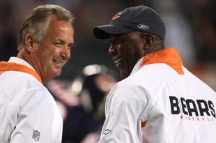 CHICAGO - SEPTEMBER 23:  (L-R) Offensive Coordinator Ron Turner and Head coach Lovie Smith of the Chicago Bears talk on field during pregame against the Dallas Cowboys at Soldier Field on September 23, 2007 in Chicago, Illinois.  (Photo by Jonathan Daniel/Getty Images)