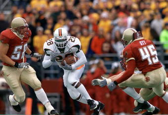 10 Nov 2001:  Clinton Portis #28 of the Miami Hurricanes cuts upfield during the second half of Saturday's game between the Miami Hurricanes and the Boston College Eagles at Alumni Field in Boston, Massachussetts.  Digital Image. Mandatory Credit: Jamie Squire/ALLSPORT