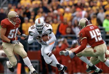 10 Nov 2001:  Clinton Portis #28 of the Miami Hurricanes cuts upfield during the second half of Saturday's game between the Miami Hurricanes and the Boston College Eagles at Alumni Field in Boston, Massachussetts.  Digital Image. Mandatory Credit: Jamie Squire/ALLSPORT