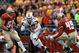 10 Nov 2001:  Clinton Portis #28 of the Miami Hurricanes cuts upfield during the second half of Saturday's game between the Miami Hurricanes and the Boston College Eagles at Alumni Field in Boston, Massachussetts.  Digital Image. Mandatory Credit: Jamie Squire/ALLSPORT