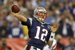 GLENDALE, AZ - FEBRUARY 03:  Quarterback Tom Brady #12 of the New England Patriots drops back to pass against the New York Giants the second half of Super Bowl XLII on February 3, 2008 at the University of Phoenix Stadium in Glendale, Arizona. The Giants defeated the Patriots 17-14.  (Photo by Donald Miralle/Getty Images)