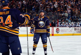 BUFFALO, NY - MARCH 27:  Tim Connolly #19 of the Buffalo Sabres skates toward teammate Chris Butler #34 after he scored a goal against the Toronto Maple Leafs on March 27, 2009 at HSBC Arena in Buffalo, New York. (Photo by Rick Stewart/Getty Images)