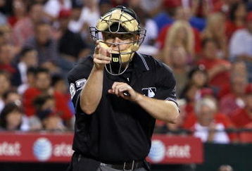 ANAHEIM, CA - AUGUST 12:  Umpire Todd Tichenor calls a strike during the game between the Seattle Mariners and the Los Angeles Angels of Anaheim at Angel Stadium on August 12, 2008 in Anaheim, California.  The Angels defeated the Mariners 7-3.  (Photo by Christian Petersen/Getty Images)