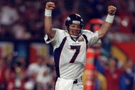 31 Jan 1999: Quarterback John Elway #7 of the Denver Broncos celebrates the first touchdown during the first quarter of Super Bowl XXXIII against the Atlanta Falcons at Pro Player Stadium in Miami, Florida. The Broncos defeated the Falcons 34-19 to win their scond consecutive Super Bowl.