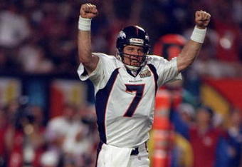 31 Jan 1999: Quarterback John Elway #7 of the Denver Broncos celebrates the first touchdown during the first quarter of Super Bowl XXXIII against the Atlanta Falcons at Pro Player Stadium in Miami, Florida. The Broncos defeated the Falcons 34-19 to win their scond consecutive Super Bowl.