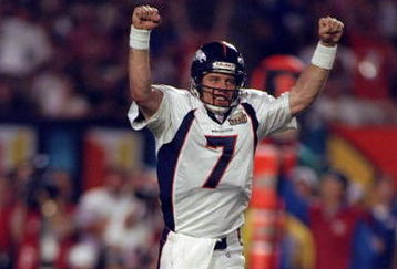 31 Jan 1999: Quarterback John Elway #7 of the Denver Broncos celebrates the first touchdown during the first quarter of Super Bowl XXXIII against the Atlanta Falcons at Pro Player Stadium in Miami, Florida. The Broncos defeated the Falcons 34-19 to win their scond consecutive Super Bowl.