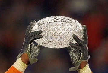 MIAMI - JANUARY 08:  Brandon Spikes #51 of the Florida Gators holds up the winning trophy after the FedEx BCS National Championship Game against the Oklahoma Sooners at Dolphin Stadium on January 8, 2009 in Miami, Florida.  (Photo by Eliot J. Schechter/Getty Images)