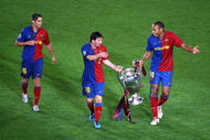 ROME - MAY 27:  Thierry Henry of Barcelona and Lionel Messi of Barcelona celebrate winning the UEFA Champions League Final match between Manchester United and Barcelona at the Stadio Olimpico on May 27, 2009 in Rome, Italy. Barcelona won 2-0.  (Photo by Paul Gilham/Getty Images)
