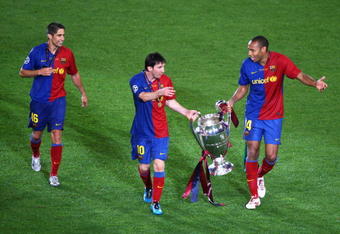 ROME - MAY 27:  Thierry Henry of Barcelona and Lionel Messi of Barcelona celebrate winning the UEFA Champions League Final match between Manchester United and Barcelona at the Stadio Olimpico on May 27, 2009 in Rome, Italy. Barcelona won 2-0.  (Photo by Paul Gilham/Getty Images)