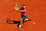 PARIS - MAY 29:  Rafael Nadal of Spain hits a backhand during his Men's Singles Third Round match against Lleyton Hewitt of Australia on day six of the French Open at Roland Garros on May 29, 2009 in Paris, France.  (Photo by Ryan Pierse/Getty Images)