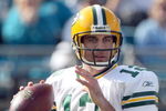 JACKSONVILLE, FL - DECEMBER 14:  Aaron Rodgers #12 of the Green Bay Packers attempts a pass during the game against the Jacksonville Jaguars at Jacksonville Municipal stadium on December 14, 2008 in Jacksonville, Florida.  (Photo by Sam Greenwood/Getty Images)