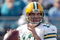 JACKSONVILLE, FL - DECEMBER 14:  Aaron Rodgers #12 of the Green Bay Packers attempts a pass during the game against the Jacksonville Jaguars at Jacksonville Municipal stadium on December 14, 2008 in Jacksonville, Florida.  (Photo by Sam Greenwood/Getty Images)