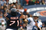 CHICAGO - NOVEMBER 02:  Lineman Israel Idonije #71 of the Chicago Bears blocks a pass from quarterback Dan Orlovsky #6 of the Detroit Lions during the fourth quarter at Soldier Field on November 2, 2008 in Chicago, Illinois. The Bears defeated the Lions 27-23.  (Photo by Jeff Gross/Getty Images)