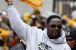 PITTSBURGH - FEBRUARY 03:  Head coach Mike Tomlin of the Pittsburgh Steelers waves a terrible towel during a parade to celebrate winning Super Bowl XLIII on February 3, 2009 in Pittsburgh, Pennsylvania.  (Photo by Gregory Shamus/Getty Images)