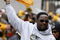 PITTSBURGH - FEBRUARY 03:  Head coach Mike Tomlin of the Pittsburgh Steelers waves a terrible towel during a parade to celebrate winning Super Bowl XLIII on February 3, 2009 in Pittsburgh, Pennsylvania.  (Photo by Gregory Shamus/Getty Images)