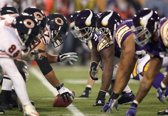 MINNEAPOLIS - NOVEMBER 30:  Center Josh Beekman #67 of the Chicago Bears gets ready to hike the ball during the game against the Minnesota Vikings at the Metrodome on November 30, 2008 in Minneapolis, Minnesota. (Photo by Jonathan Ferrey/Getty Images)