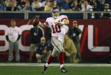 GLENDALE, AZ - FEBRUARY 03:  Quarterback Eli Manning #10 of the New York Giants passes against the New England Patriots during Super Bowl XLII on February 3, 2008 at the University of Phoenix Stadium in Glendale, Arizona.  (Photo by Donald Miralle/Getty Images)