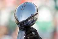 EAST RUTHERFORD, NJ - OCTOBER 26:  Members of the 1968 Jets touch the Lombardi Trophy during halftime festivities celebrating the 40th anniversary of the team's win over the Colts in Super Bowl III during the game between the Kansas City Chiefs and the New York Jets on October 26, 2008 at Giants Stadium in East Rutherford, New Jersey.  (Photo by Jarrett Baker/Getty Images)