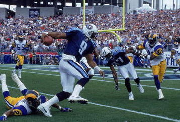 31 Oct 1999: Steve McNair #9 of the Nashville Titans scrambles with the ball during a game against the St. Louis Rams at the Adelphia Coliseum in Nashville, Tennessee. The Titans defeated the Rams 24-21. Mandatory Credit:  Jonathan Daniel/Allsport