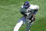 MILWAUKEE - MAY 14: Mike Cameron #25 of the Milwaukee Brewers catches the ball on a bounce against the Florida Marlins on May 14, 2009 at Miller Park in Milwaukee, Wisconsin. The Brewers defeated the Marlins 5-3. (Photo by Jonathan Daniel/Getty Images)
