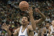 18 Mar 2001: Julius Peppers #45 of North Carolina rebounds against Penn State during their NCAA South Regional Second Round Game at the Lousiana Superdome in New Orleans, Louisiana. DIGITAL IMAGE. Mandatory Credit: Jamie Squire/ALLSPORT