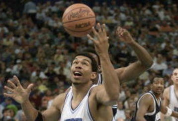 18 Mar 2001:  Julius Peppers #45 of North Carolina rebounds against Penn State during their NCAA South Regional Second Round Game at the Lousiana Superdome in New Orleans, Louisiana. DIGITAL IMAGE.  Mandatory Credit: Jamie Squire/ALLSPORT