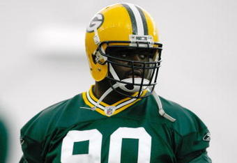 GREEN BAY, WI - MAY 1:  Defensive lineman B.J. Raji #90 runs as he participates in practice drills during Green Bay Packers Minicamp at Don Hutson Center on May 1, 2009 in Green Bay, Wisconsin. (Photo by Scott Boehm/Getty Images)