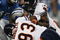 DETROIT - SEPTEMBER 30: Mark Anderson #97 and Adewale Ogunleye #93 of the Chicago Bears sack Jon Kitna #8 of the Detroit Lions, who fumbles the ball, in the first quarter on September 30, 2007 at Ford Field in Detroit, Michigan. The Lions defeated the Bears 37-27. (Photo by Jonathan Daniel/Getty Images)