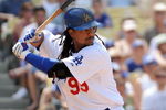 LOS ANGELES, CA - APRIL 19:  Manny Ramirez #99 of the Los Angeles Dodgers at bat against the Colorado Rockies during the game at Dodger Stadium on April 19, 2009 in Los Angeles, California.  (Photo by Harry How/Getty Images)