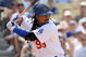 LOS ANGELES, CA - APRIL 19: Manny Ramirez #99 of the Los Angeles Dodgers at bat against the Colorado Rockies during the game at Dodger Stadium on April 19, 2009 in Los Angeles, California. (Photo by Harry How/Getty Images)