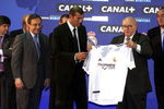 9 Jul 2001:  Zinedine Zidane of France is presented with his shirt by Real Madrid President Florentino Perez and Di Stefano during a press conference to announce his signing for Real Madrid from Juventus of Italy, at the Palacio De Hielo in Madrid, Spain. Mandatory Credit: Allsport UK/ALLSPORT