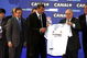 9 Jul 2001:  Zinedine Zidane of France is presented with his shirt by Real Madrid President Florentino Perez and Di Stefano during a press conference to announce his signing for Real Madrid from Juventus of Italy, at the Palacio De Hielo in Madrid, Spain. Mandatory Credit: Allsport UK/ALLSPORT