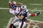 GLENDALE, AZ - FEBRUARY 03:  David Tyree #85 of the New York Giants catches a 32-yard pass from Eli Manning #10 as Rodney Harrison #37 of the New England Patriots attempts to knock it out in the fourth quarter of Super Bowl XLII on February 3, 2008 at the University of Phoenix Stadium in Glendale, Arizona. The Giants defeated the Patriots 17-14.  (Photo by Doug Pensinger/Getty Images)