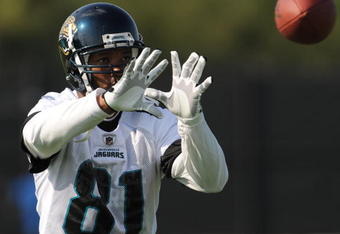 JACKSONVILLE, FL - MAY 1:  Wide receiver Torry Holt #81 of the Jacksonville Jaguars reaches for a pass during a team mini-camp on May 1, 2009 on the practice fields at Jacksonville Municipal Stadium in Jacksonville, Florida.  (Photo by Al Messerschmidt/Getty Images)