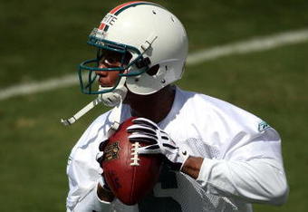 DAVIE, FL - MAY 02:  Rookie quarterback Pat White  #6 of the Miami Dolphins drops back to pass during mini camp on May 2, 2009 at the Miami Dolphins Training facility in Davie, Florida.  (Photo by Marc Serota/Getty Images)
