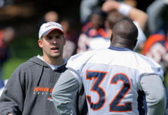 ENGLEWOOD, CO - MAY 03:  Head coach Josh McDaniels of the Denver Broncos chats with running back LaMont Jordan #32 during minicamp at the Broncos training facility on May 3, 2009 in Englewood, Colorado.  (Photo by Doug Pensinger/Getty Images)