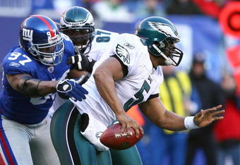 EAST RUTHERFORD, NJ - JANUARY 11:  Quarterback Donovan McNabb #5 of the Philadelphia Eagles scrambles in the pocket during the NFC Divisional Playoff Game against the New York Giants on January 11, 2009 at Giants Stadium in East Rutherford, New Jersey.  The Eagles defeated the Giants 23-11. (Photo by Al Bello/Getty Images)